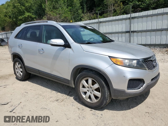 2013 Kia Sorento LX with VIN 5XYKT4A20DG323200, listed as a Copart auction lot 61738005 with 205,312 mi miles and Salvage title. Bid and sale history available at DreamBid. Image 4.
