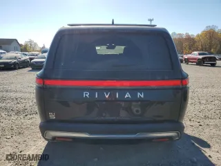 2022 Rivian R1S Launch Edition with VIN 7PDSGABL6NN001531, listed as a Copart auction lot 77143684 with 27,241 mi miles and Salvage Title. Bid and sale history available at carsss.com. Image 6.