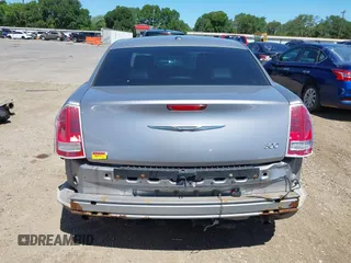 2014 Chrysler 300 with VIN 2C3CCAAG8EH264595, listed as a IAAI auction lot 42076996 with 101,659 mi miles and . Bid and sale history available at DreamBid. Image 17.