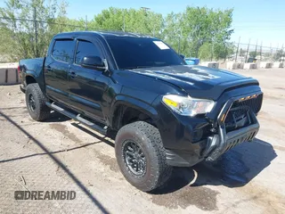 2019 Toyota Tacoma SR z VIN 3TMCZ5AN9KM246846, wystawiony jako IAAI lot #42246848 z przebiegiem 151 562 mil mil oraz . Historia ofert i sprzedaży dostępna na DreamBid. Obrazek 1.
