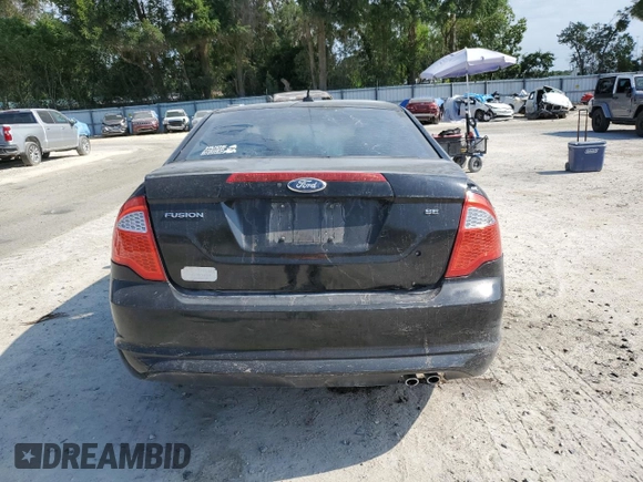 2012 Ford Fusion SE with VIN 3FAHP0HA3CR167698, listed as a Copart auction lot 55909695 with 128,025 mi miles and Salvage title. Bid and sale history available at DreamBid. Image 6.