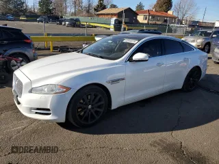 2013 Jaguar XJ with VIN SAJWJ1CD7D8V46315, listed as a Copart auction lot 46944415 with 82,672 mi miles and Salvage Title. Bid and sale history available at carsss.com. Image 1.