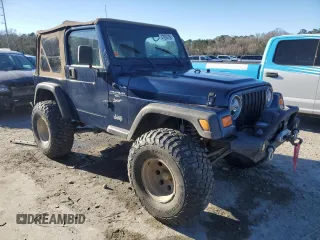 2000 Jeep Wrangler Sport with VIN 1J4FA49S7YP802304, listed as a Copart auction lot 47854795 with 0 mi miles and Salvage Title. Bid and sale history available at carsss.com. Image 4.