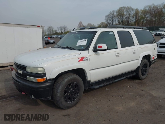 2004 Chevrolet Suburban Z71 with VIN 3GNFK16ZX4G103404, listed as a IAAI auction lot 42100161 with 321,012 mi miles. Bid and sale history available at carsss.com. Image 2.
