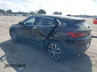 2022 BMW X2 sDrive28i z VIN WBXYH9C00N5U57853, wystawiony jako IAAI lot #41958326 z przebiegiem 49 518 mil mil oraz . Historia ofert i sprzedaży dostępna na DreamBid. Obrazek 3.