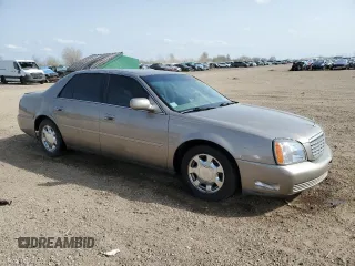 2001 Cadillac DeVille z VIN 1G6KD54YX1U242656, wystawiony jako Copart lot #54566105 z przebiegiem 200 016 mil mil oraz Szkoda całkowita • Salvage title. Historia ofert i sprzedaży dostępna na DreamBid. Obrazek 4.