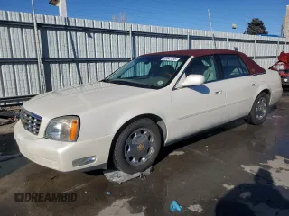 2002 Cadillac DeVille DHS z VIN 1G6KE57Y02U269956, wystawiony jako Copart lot #88047795 z przebiegiem 97 101 mil mil oraz Szkody całkowita. Historia ofert i sprzedaży dostępna na DreamBid. Obrazek 1.