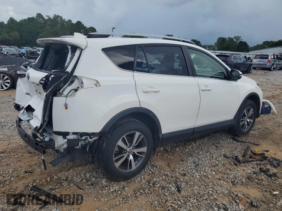 2018 Toyota RAV4 XLE with VIN JTMWFREV0JJ204150, listed as a Copart auction lot 59610825 with 34,730 mi miles and Salvage title. Bid and sale history available at DreamBid. Image 3.