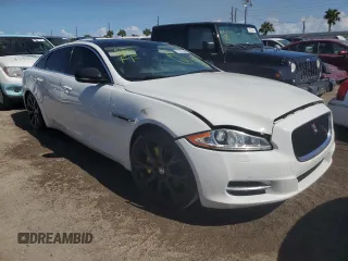 2014 Jaguar XJ Portfolio z VIN SAJWA2GZ0E8V59422, wystawiony jako Copart lot #74213414 z przebiegiem 96 314 mil mil oraz Nie do naprawy • Non repairable. Historia ofert i sprzedaży dostępna na DreamBid. Obrazek 4.