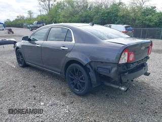 2012 Chevrolet Malibu LTZ with VIN 1G1ZG5E74CF297032, listed as a IAAI auction lot 42133482 with 82,682 mi miles and . Bid and sale history available at DreamBid. Image 3.