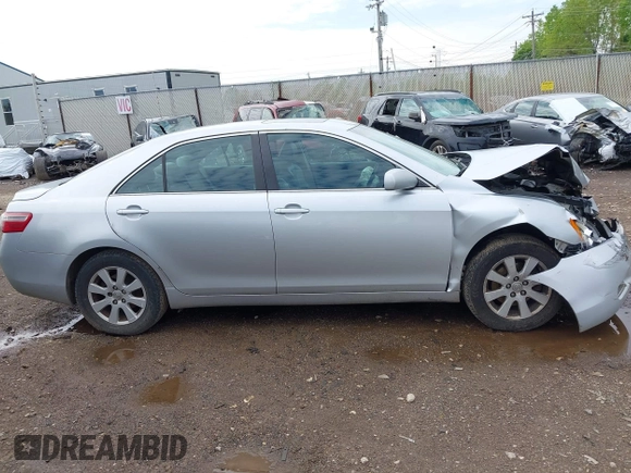 2007 Toyota Camry LE with VIN 4T1BK46K27U037911, listed as a IAAI auction lot 42158405 with 247,722 mi miles and . Bid and sale history available at DreamBid. Image 13.