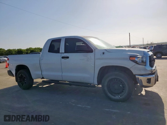 2018 Toyota Tundra SR with VIN 5TFUW5F11JX758421, listed as a Copart auction lot 64495965 with 65,803 mi miles and Clean title. Bid and sale history available at DreamBid. Image 4.