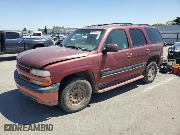 2001 Chevrolet Tahoe LT with VIN 1GNEC13T71R164164, listed as a Copart auction lot 60066165 with 234,506 mi miles and Salvage title. Bid and sale history available at DreamBid. Image 1.