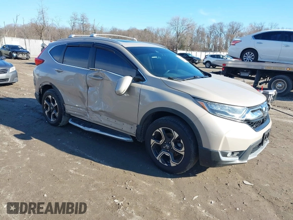 2017 Honda CR-V Touring with VIN 5J6RW2H94HL013536, listed as a IAAI auction lot 41577317 with 97,132 mi miles. Bid and sale history available at carsss.com. Image 1.