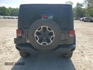 2016 Jeep Wrangler Unlimited Rubicon Hard Rock z VIN 1C4BJWFG6GL125252, wystawiony jako Copart lot #55241115 z przebiegiem 193 554 mil mil oraz Szkoda całkowita • Salvage title. Historia ofert i sprzedaży dostępna na DreamBid. Obrazek 6.