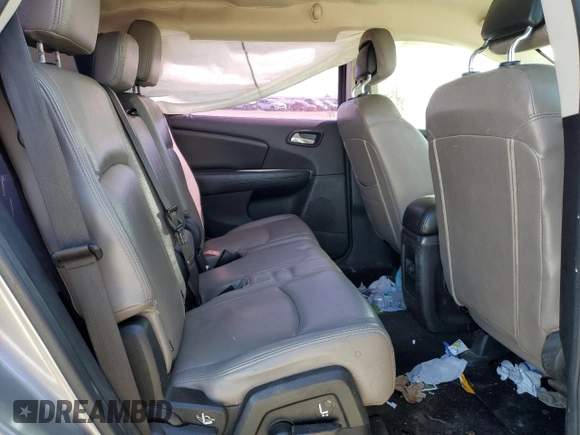 2015 Dodge Journey American Value with VIN 3C4PDCABXFT712192, listed as a Copart auction lot 55680975 with 104,579 mi miles and Salvage Title. Bid and sale history available at DreamBid. Image 11.