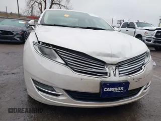 2015 Lincoln MKZ Hybrid with VIN 3LN6L2LU3FR612824, listed as a IAAI auction lot 41475840 with 122,499 mi miles and . Bid and sale history available at carsss.com. Image 12.