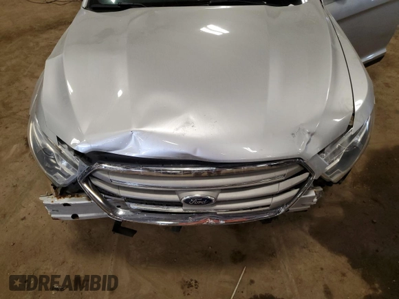 2013 Ford Taurus SEL z VIN 1FAHP2E82DG174647, wystawiony jako Copart lot #53784995 z przebiegiem Nie podano mil oraz Szkoda całkowita • Salvage title. Historia ofert i sprzedaży dostępna na DreamBid. Obrazek 11.