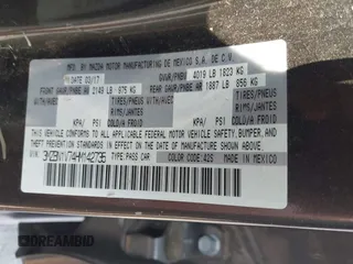 2017 Mazda 3 Touring with VIN 3MZBN1V74HM142735, listed as a IAAI auction lot 42395462 with 137,543 mi miles and . Bid and sale history available at DreamBid. Image 9.