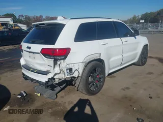 2017 Jeep Grand Cherokee SRT with VIN 1C4RJFDJ6HC754640, listed as a IAAI auction lot 40944008 with 93,412 mi miles. Bid and sale history available at carsss.com. Image 4.