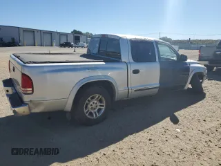 2003 Dodge Dakota SLT with VIN 1D7HL48X33S340079, listed as a Copart auction lot 76516514 with 295,350 mi miles and Clean Title. Bid and sale history available at carsss.com. Image 3.