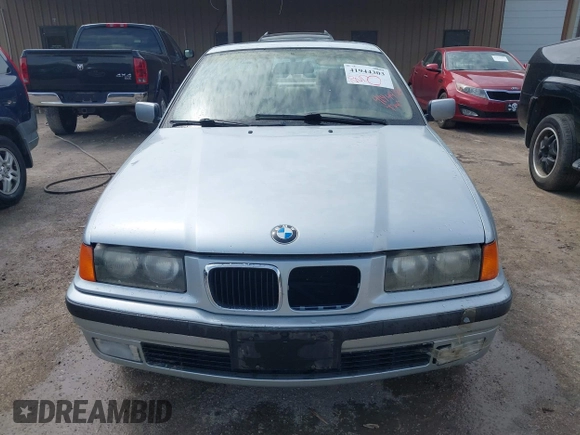 1998 BMW 3 Series 318i with VIN WBACC9322WEE60522, listed as a IAAI auction lot 41944303 with 226,799 mi miles. Bid and sale history available at carsss.com. Image 6.