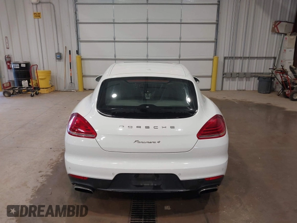 2016 Porsche Panamera 4 z VIN WP0AA2A71GL000087, wystawiony jako IAAI lot #41435476 z przebiegiem 103 537 mil mil oraz . Historia ofert i sprzedaży dostępna na DreamBid. Obrazek 16.