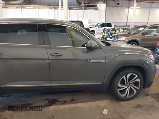 2021 Volkswagen Atlas SEL Premium with VIN 1V2TE2CA8MC207933, listed as a IAAI auction lot 41823640 with 64,425 mi miles and . Bid and sale history available at DreamBid. Image 13.