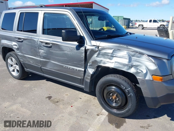 2014 Jeep Patriot Sport with VIN 1C4NJRBB5ED574390, listed as a IAAI auction lot 41949395 with 61,911 mi miles. Bid and sale history available at carsss.com. Image 6.