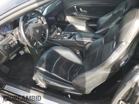 2014 Maserati GranTurismo Sport z VIN ZAM45VMAXE0088951, wystawiony jako Copart lot #78580054 z przebiegiem 72 970 mil mil oraz Szkoda całkowita • Salvage title. Historia ofert i sprzedaży dostępna na DreamBid. Obrazek 7.