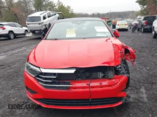 2021 Volkswagen Jetta SEL with VIN 3VWE57BU2MM041875, listed as a IAAI auction lot 41534030 with 20,282 mi miles and . Bid and sale history available at DreamBid. Image 12.