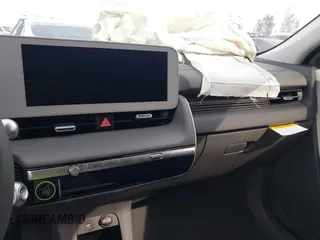 2024 Hyundai Ioniq 5 SE z VIN KM8KM4DE3RU335734, wystawiony jako IAAI lot #41657647 z przebiegiem 445 mil mil oraz . Historia ofert i sprzedaży dostępna na DreamBid. Obrazek 19.