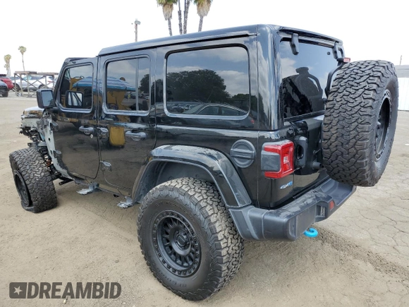 2024 Jeep Wrangler Sahara with VIN 1C4RJXP60RW116607, listed as a Copart auction lot 54562695 with 62,352 mi miles and Salvage title. Bid and sale history available at DreamBid. Image 2.