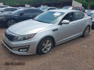 2015 Kia Optima LX z VIN 5XXGM4A70FG385024, wystawiony jako IAAI lot #42256238 z przebiegiem 162 395 mil mil oraz . Historia ofert i sprzedaży dostępna na DreamBid. Obrazek 2.