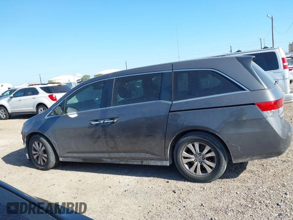 2015 Honda Odyssey EX-L z VIN 5FNRL5H64FB081051, wystawiony jako IAAI lot #42006508 z przebiegiem 154 923 mil mil oraz . Historia ofert i sprzedaży dostępna na DreamBid. Obrazek 14.