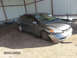 2009 Honda Civic LX z VIN 2HGFA16579H522571, wystawiony jako IAAI lot #41454988 z przebiegiem 238 550 mil mil oraz . Historia ofert i sprzedaży dostępna na DreamBid. Obrazek 1.