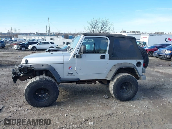 2003 Jeep Wrangler X with VIN 1J4FA39S33P363153, listed as a IAAI auction lot 41584805 with 160,676 mi miles. Bid and sale history available at carsss.com. Image 15.