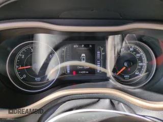 2015 Jeep Cherokee Sport z VIN 1C4PJLAB6FW689285, wystawiony jako Copart lot #54341465 z przebiegiem 114 293 mil mil oraz Szkoda całkowita • Salvage title. Historia ofert i sprzedaży dostępna na DreamBid. Obrazek 9.