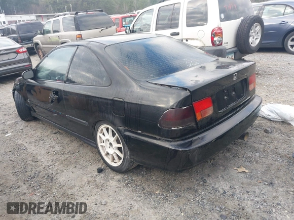 1997 Honda Civic DX with VIN 1HGEJ6125VL095006, listed as a IAAI auction lot 41473812 with 264,966 mi miles. Bid and sale history available at carsss.com. Image 3.