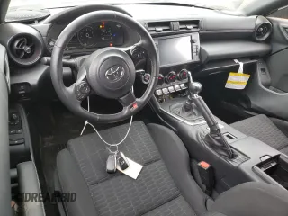 2024 Toyota GR86 with VIN JF1ZNBB16R9752214, listed as a Copart auction lot 42644345 with 12,238 mi miles and Salvage Title. Bid and sale history available at carsss.com. Image 8.