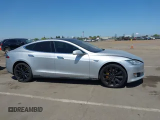 2013 Tesla Model S with VIN 5YJSA1CN5DFP11381, listed as a IAAI auction lot 42087803 with 146,818 mi miles and . Bid and sale history available at DreamBid. Image 12.