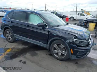 2018 Volkswagen Tiguan Wolfsburg Edition with VIN 3VV5B7AX7JM154967, listed as a IAAI auction lot 41433312 with 61,679 mi miles. Bid and sale history available at carsss.com. Image 1.