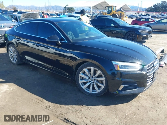 2018 Audi A5 Sportback Premium z VIN WAUANCF53JA009200, wystawiony jako IAAI lot #41725501 z przebiegiem 107 076 mil mil oraz . Historia ofert i sprzedaży dostępna na DreamBid. Obrazek 1.