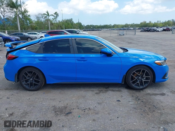 2023 Honda Civic Sport Touring z VIN 19XFL1H84PE002868, wystawiony jako IAAI lot #41978174 z przebiegiem 42 604 mil mil oraz . Historia ofert i sprzedaży dostępna na DreamBid. Obrazek 13.