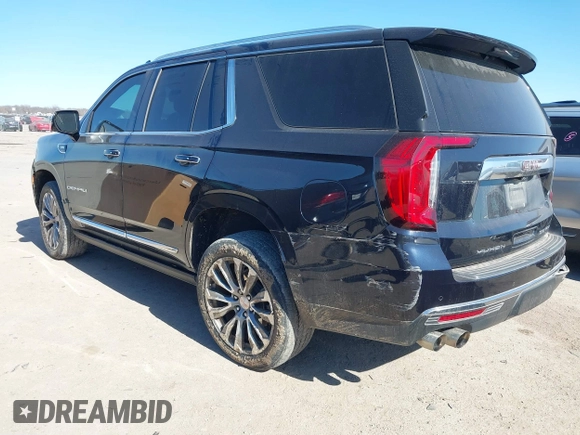 2021 GMC Yukon Denali with VIN 1GKS2DKL1MR135771, listed as a IAAI auction lot 41403680 with 61,772 mi miles. Bid and sale history available at carsss.com. Image 3.