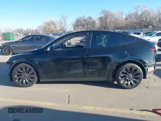 2022 Tesla Model Y Performance with VIN 7SAYGDEF0NF447541, listed as a IAAI auction lot 41762592 with 41,204 mi miles and . Bid and sale history available at DreamBid. Image 15.