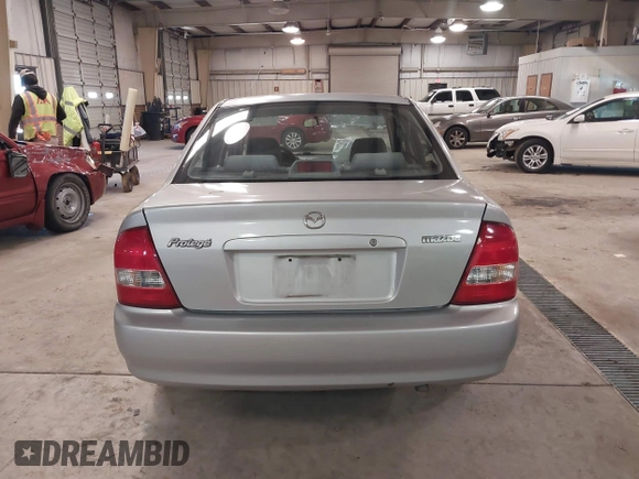 2000 Mazda Protege DX with VIN JM1BJ2226Y0206340, listed as a IAAI auction lot 41645396 with 238,500 mi miles and . Bid and sale history available at DreamBid. Image 16.