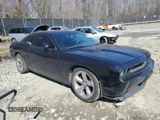 2014 Dodge Challenger R/T Plus z VIN 2C3CDYBT5EH108936, wystawiony jako Copart lot #46652305 z przebiegiem 229 673 mil mil oraz Szkoda całkowita • Salvage title. Historia ofert i sprzedaży dostępna na DreamBid. Obrazek 4.