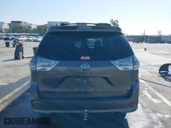 2012 Toyota Sienna SE with VIN 5TDXK3DCXCS233593, listed as a IAAI auction lot 41959611 with 85,558 mi miles. Bid and sale history available at carsss.com. Image 17.