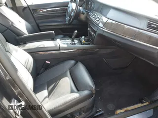 2012 BMW 7 Series 750Li xDrive with VIN WBAKC8C55CC436123, listed as a IAAI auction lot 41779443 with 126,618 mi miles and . Bid and sale history available at DreamBid. Image 5.